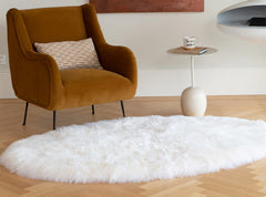 A large sheepskin area rug in an modern living room