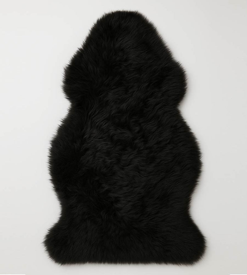 Black motorcycle sheepskin for added comfort on genuine shearling