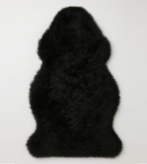 Black motorcycle sheepskin for added comfort on genuine shearling